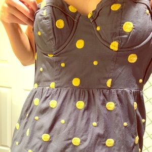 Strapless navy and mustard polka dot dress